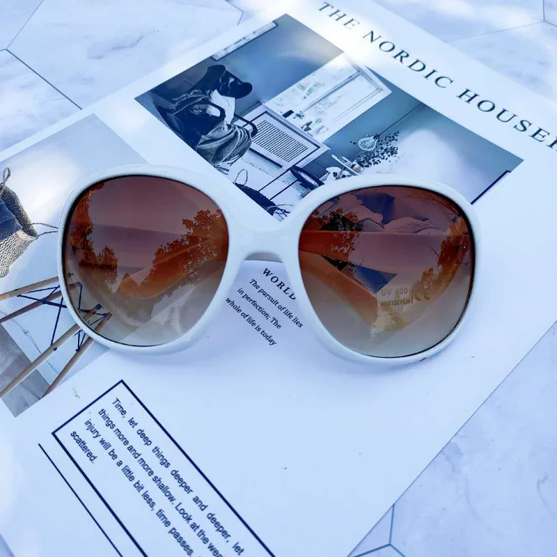 Nuovi Occhiali da Sole con Mon - Designer Sunglasses recensione e prezzo